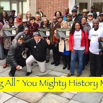 Community group photo at public education advocacy event