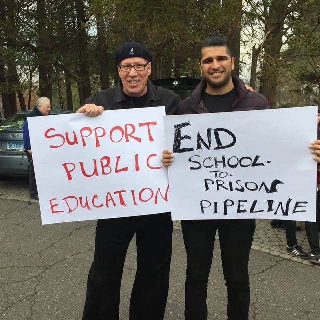 Protest signs: Support Public Education, End School-to-Prison Pipeline